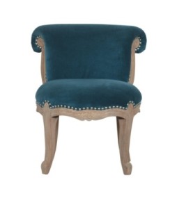 Fauteuil clouté en velours turquoise