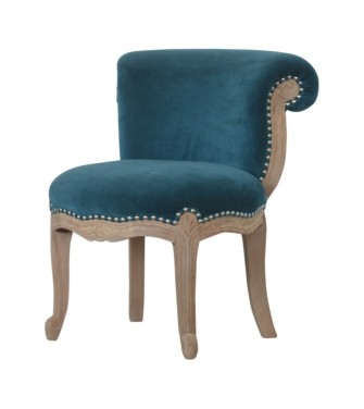 Fauteuil clouté en velours turquoise