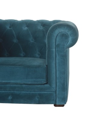 Fauteuil Chesterfield en velours bleu sarcelle