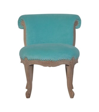 Fauteuil clouté en velours aqua