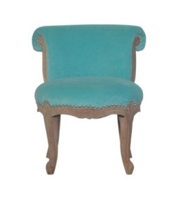 Fauteuil clouté en velours aqua