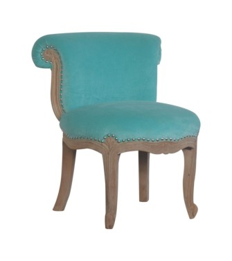 Fauteuil clouté en velours aqua