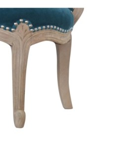 Fauteuil clouté en velours turquoise