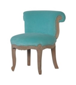 Fauteuil clouté en velours aqua
