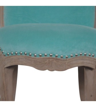 Fauteuil clouté en velours aqua