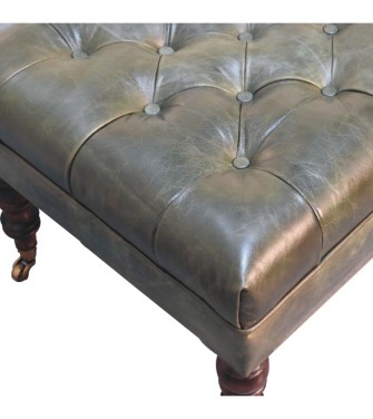 Pouf en cuir vert buffle avec pieds à roulettes