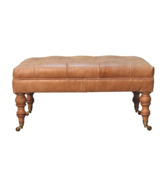 Pouf en cuir fauve avec pieds à roulettes