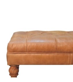 Pouf en cuir fauve avec pieds à roulettes