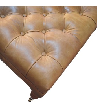 Pouf en cuir fauve avec pieds à roulettes