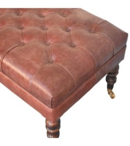 Pouf en cuir marron buffle avec pieds à roulettes