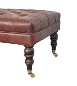 Pouf en cuir marron buffle avec pieds à roulettes