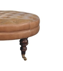 Pouf rond en cuir de buffle marron avec pieds à roulettes